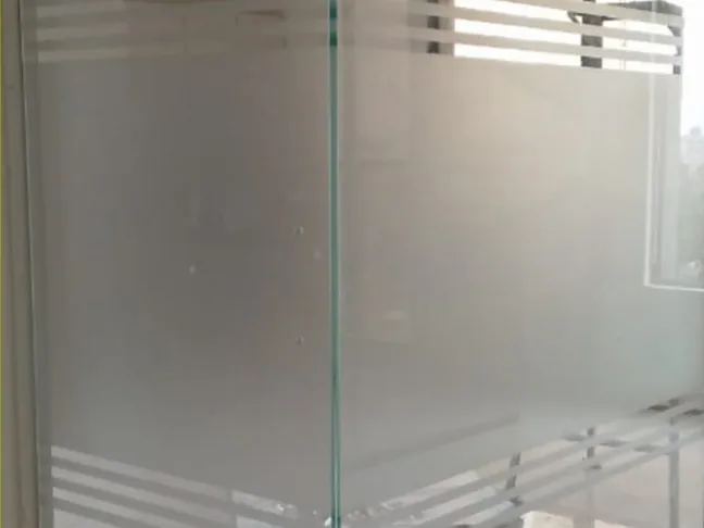 The same partition after frosting, with clear bands left at sill and head height