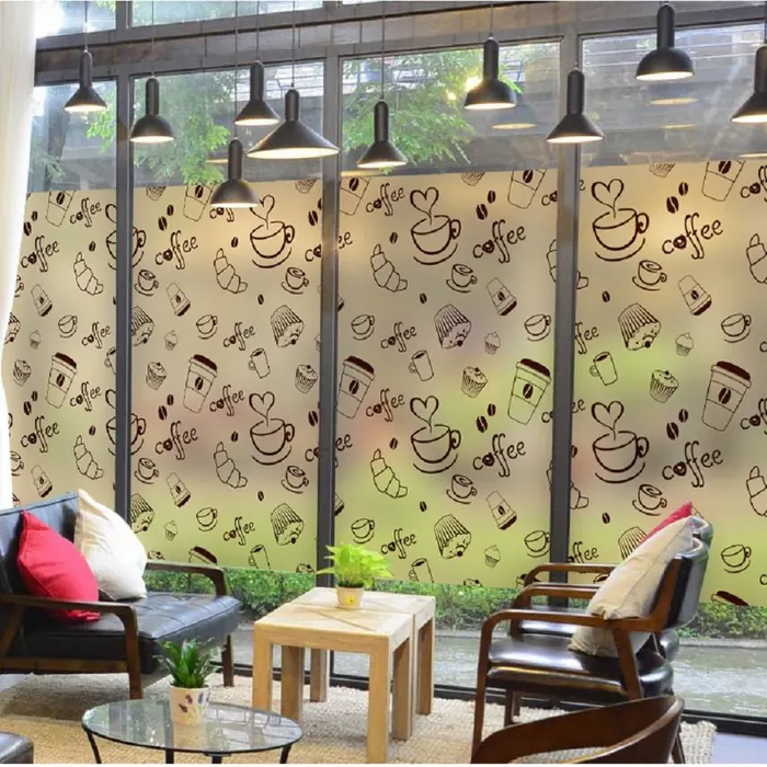Coffee-cup pattern film across a cafe's street glazing