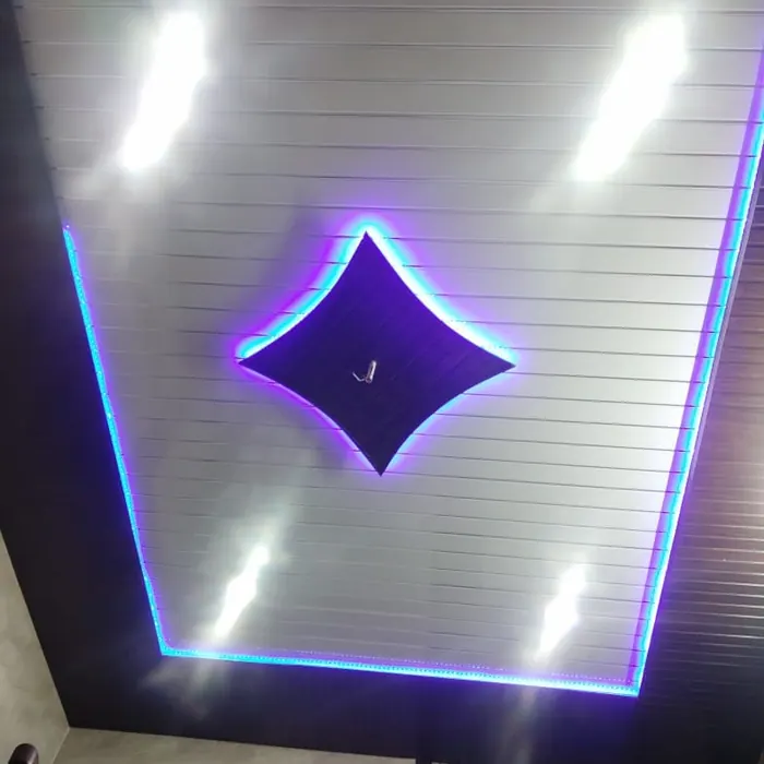 PVC ceiling panel lit by a coloured LED cove