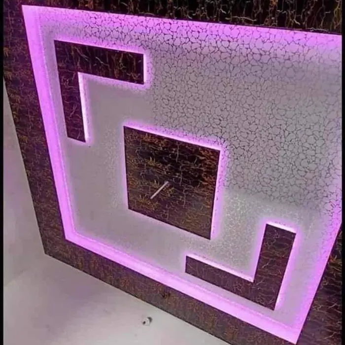 Geometric ceiling design lit in pink LED