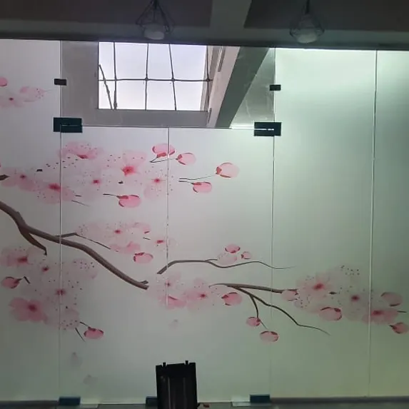 Cherry blossom pattern cut into a glass partition