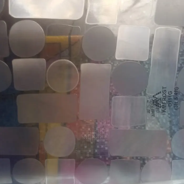 Overlapping circles and squares in a decorative window film