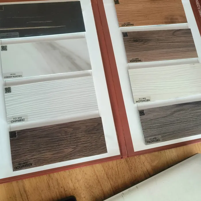 Flooring finishes displayed on a sample board