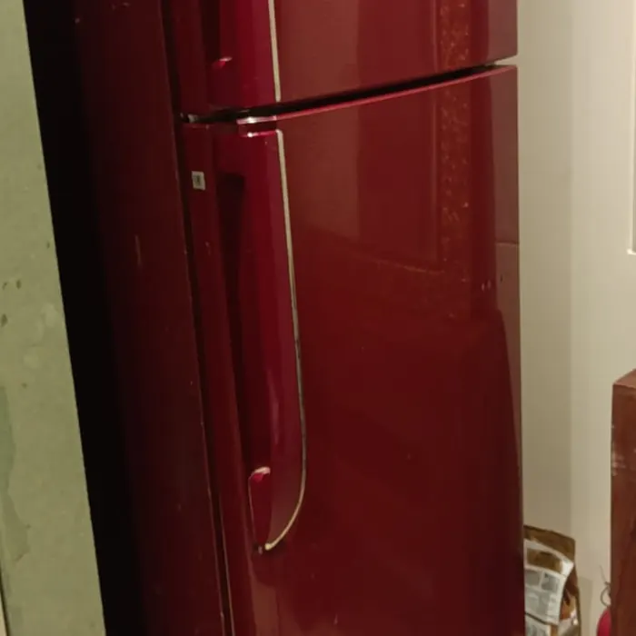 Refrigerator laminated in a deep red gloss finish