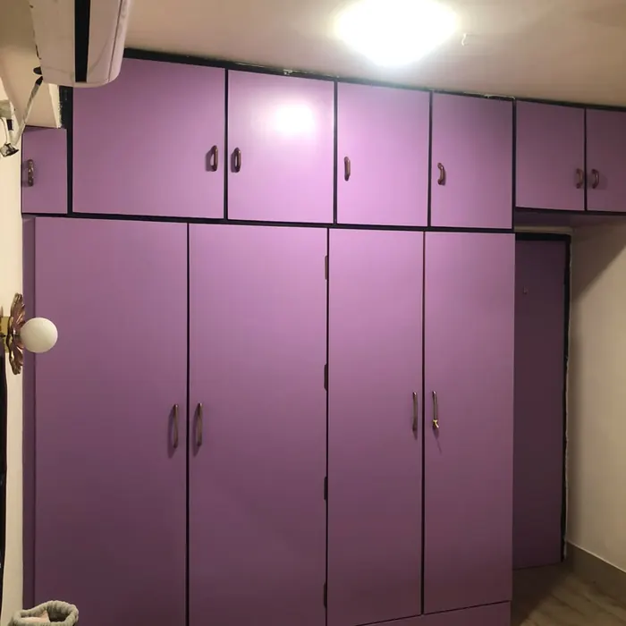 Wardrobe shutters relaminated in a gloss purple finish