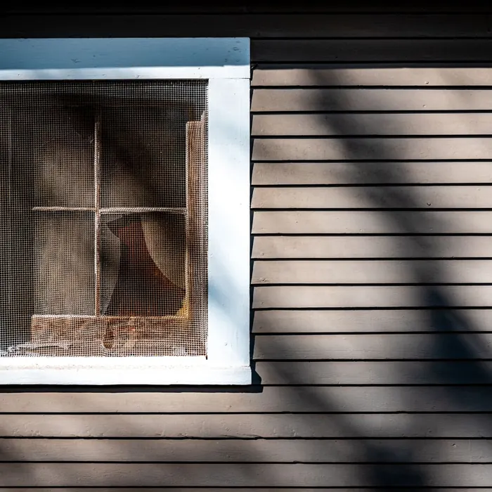 Fine mesh screen fitted into a window opening