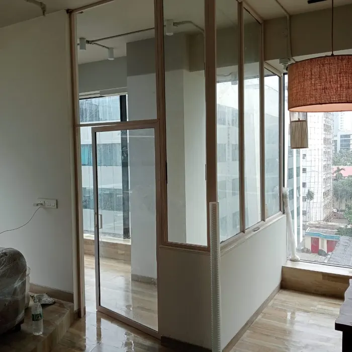 Reeded glass partitions along an office walkway