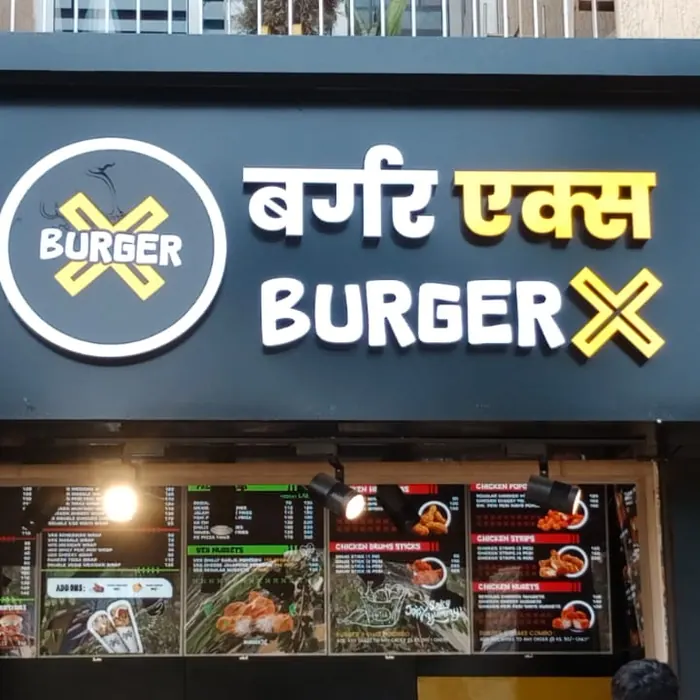 Fascia sign and menu graphics on a burger outlet