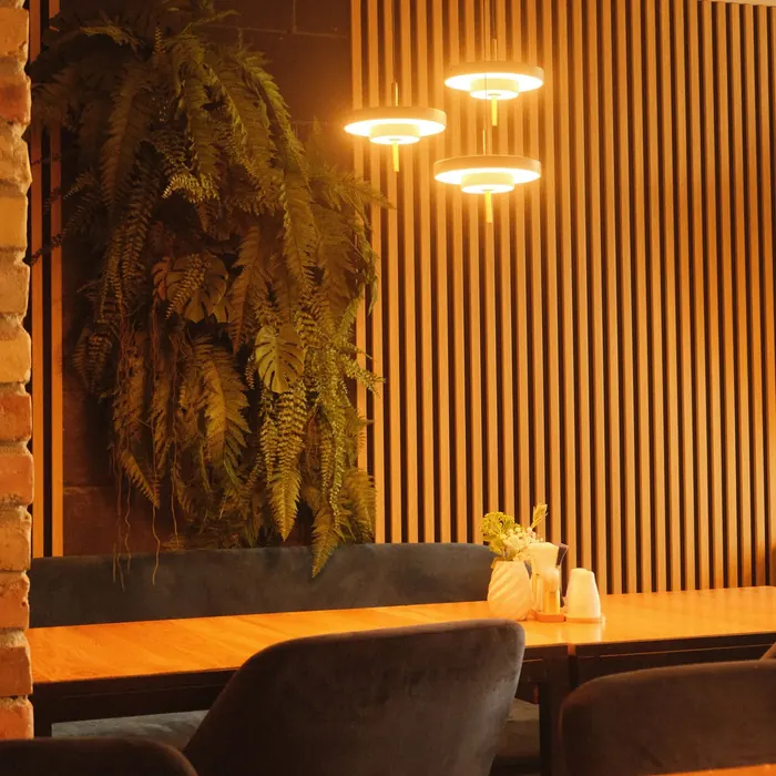 Timber slat wall behind cafe seating
