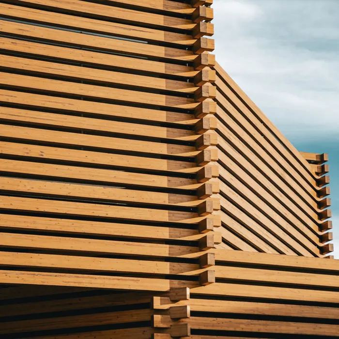 Angled timber slats forming a screen wall