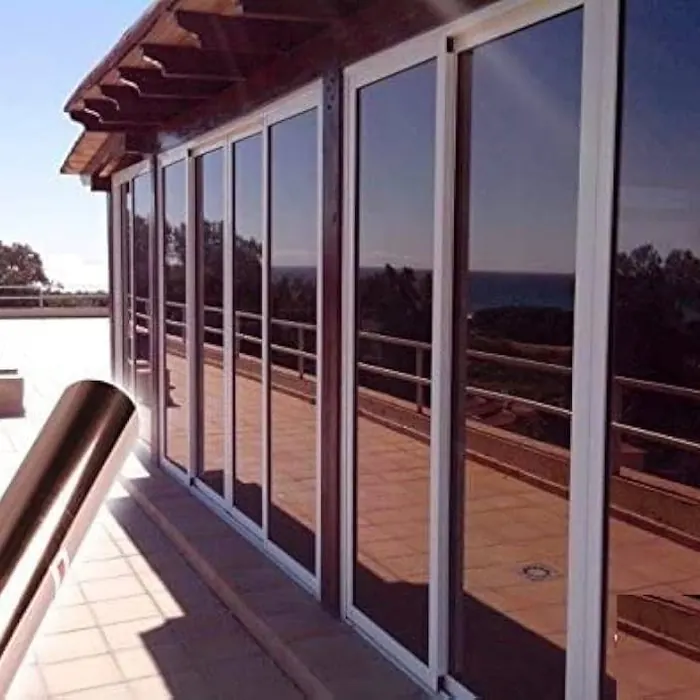 Reflective film along a long run of terrace windows