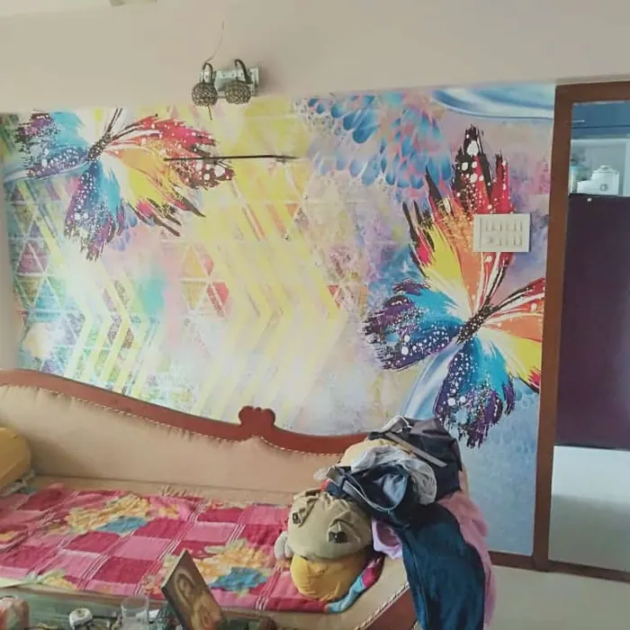Butterfly mural brightening a child's bedroom