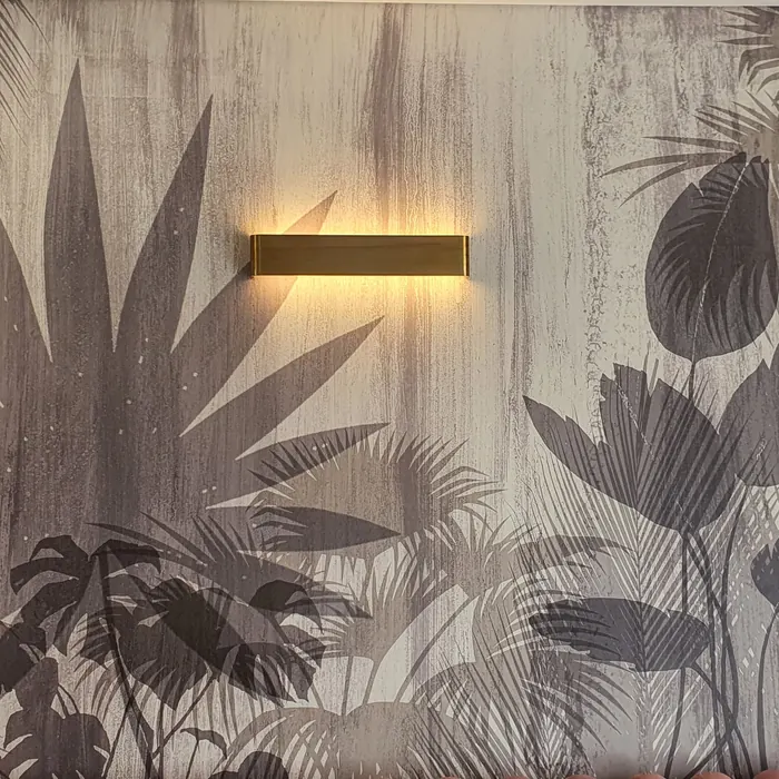 Monochrome botanical wallpaper along a passage