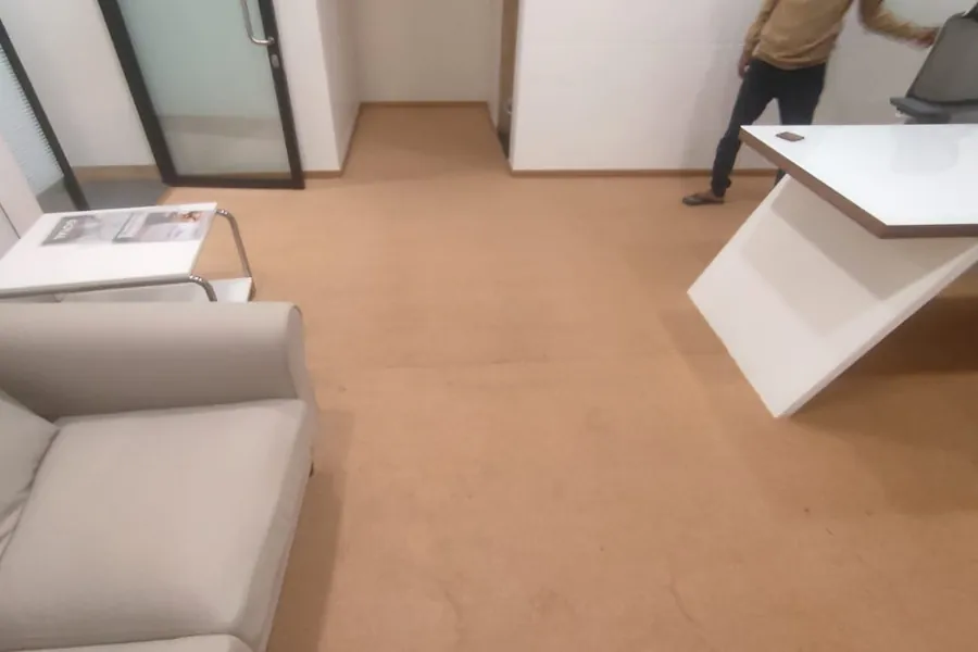 Carpet laid wall to wall in an office cabin