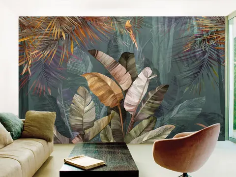 Tropical leaf mural covering a living room feature wall